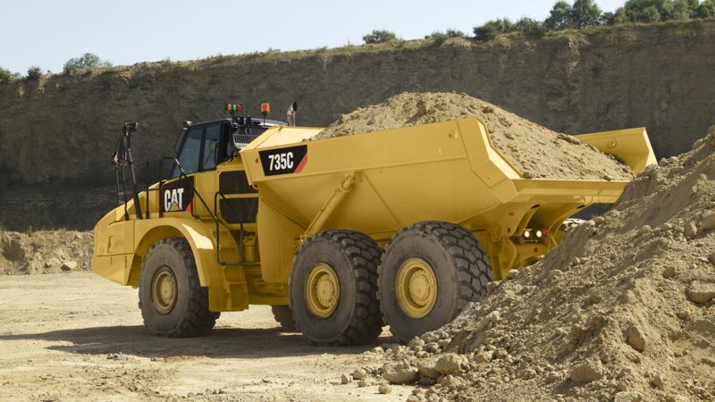 Сочлененные самосвалы Caterpillar 735C 4453